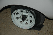 Scamp's flat tire on I-694.